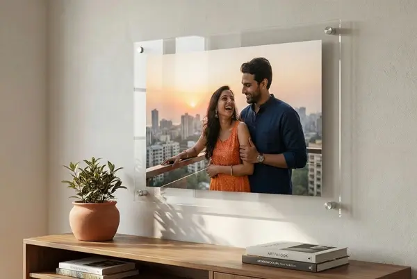 The Crystal — acrylic photo frame on a desk with crystal-clear depth